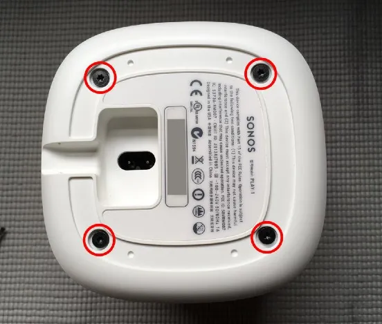 The four base screws, circled