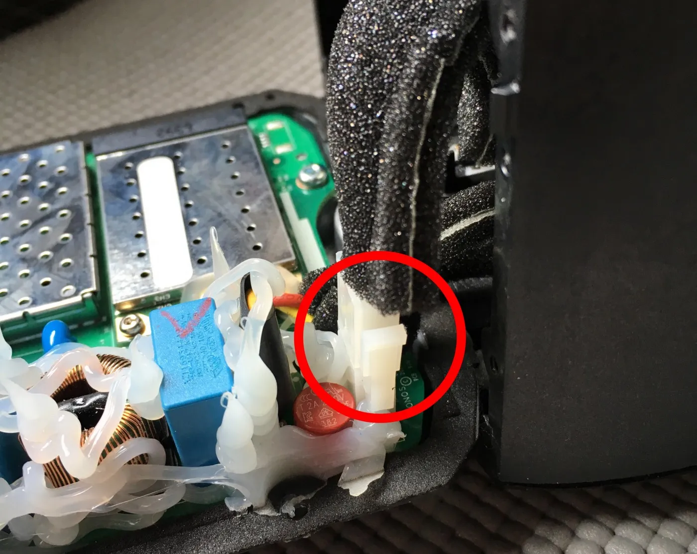 The power cable's connector, circled