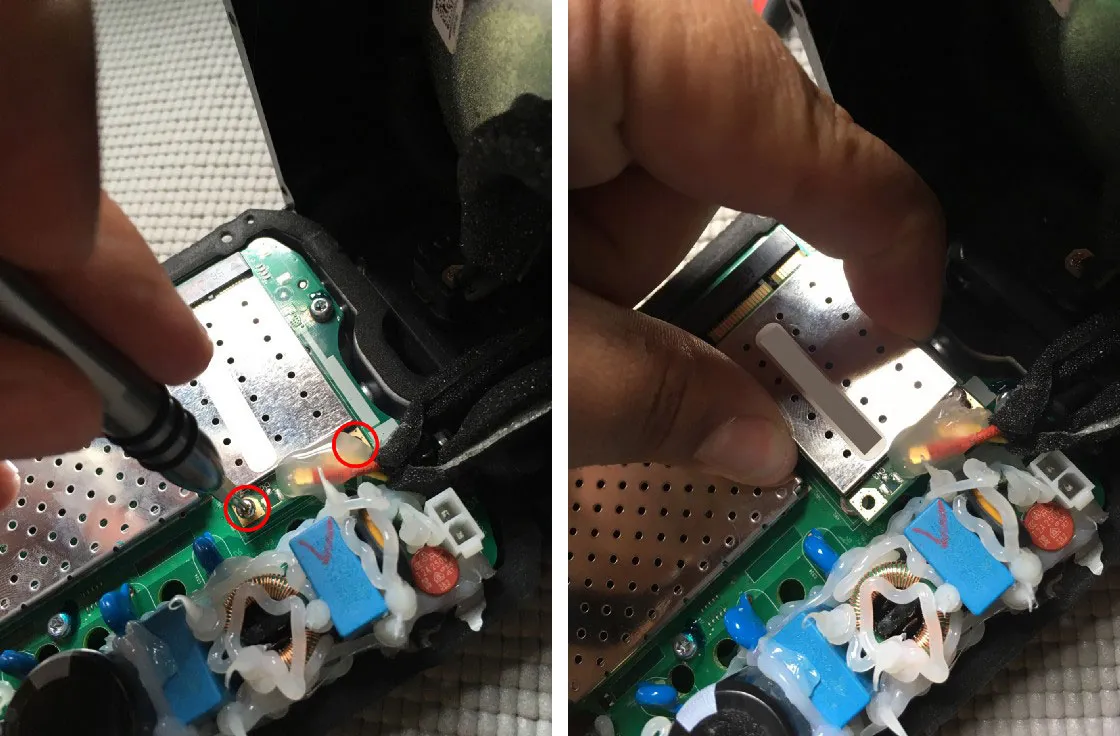 Removing the Wi-Fi card's screws, then pulling the card out