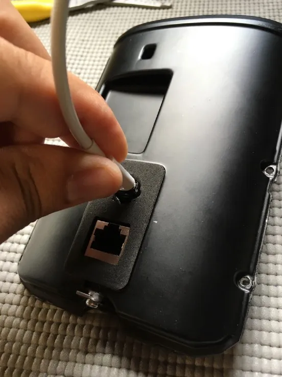The port glued in place, held centred by a USB-C cable