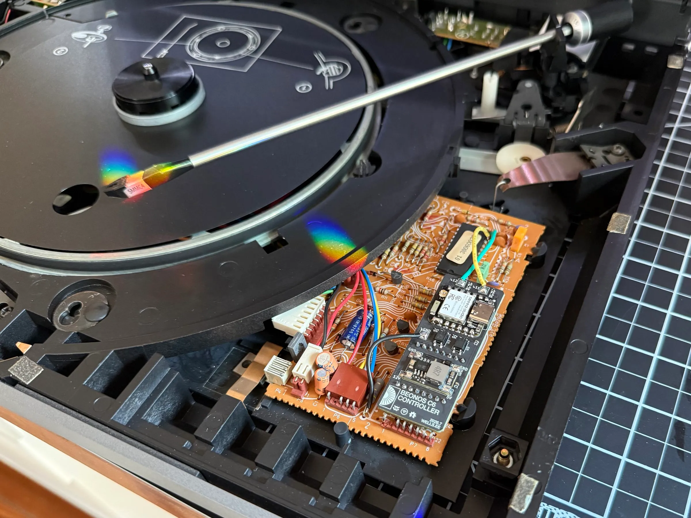 A Beonos controller wired onto the Beogram's original control board, inside the turntable