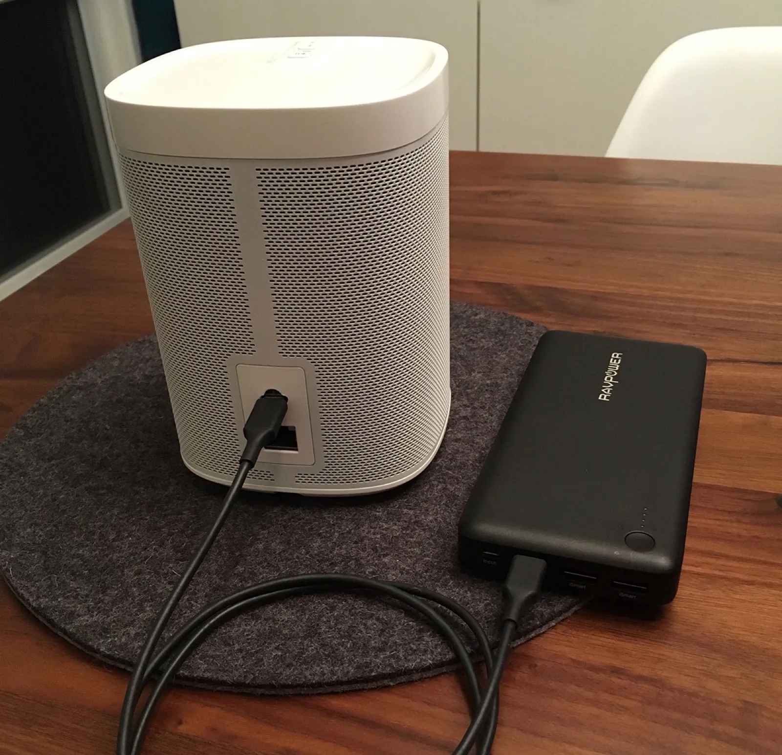 A Sonos Play:1 powered by a USB-C battery pack