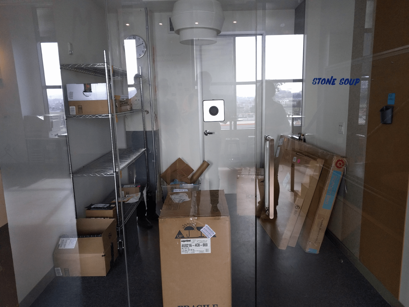 packages stacked in a supply closet