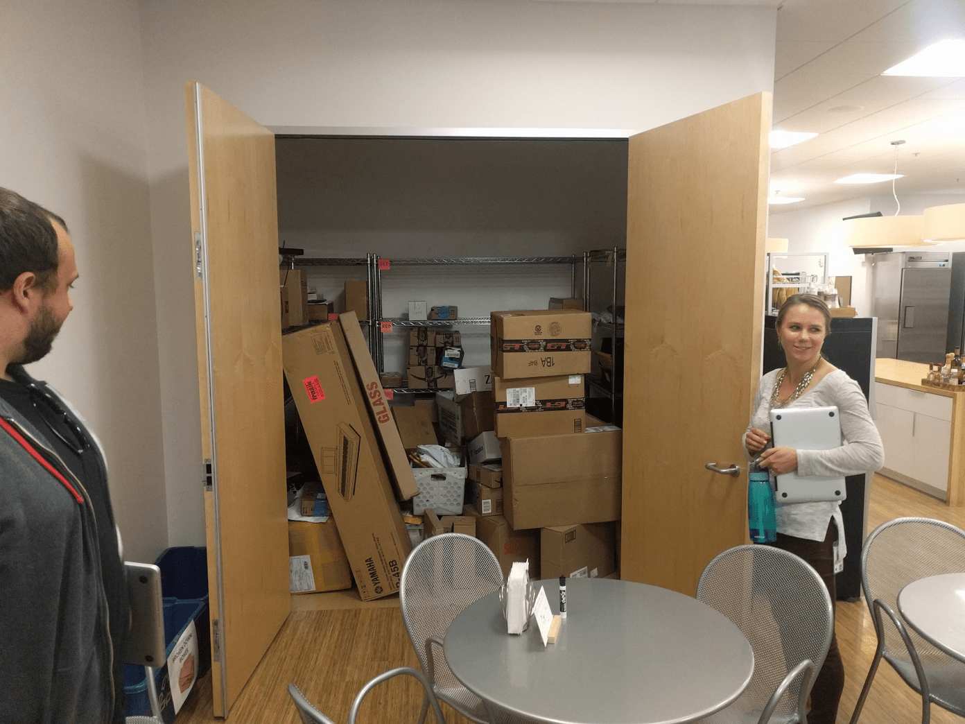 packages stacked in a conference room